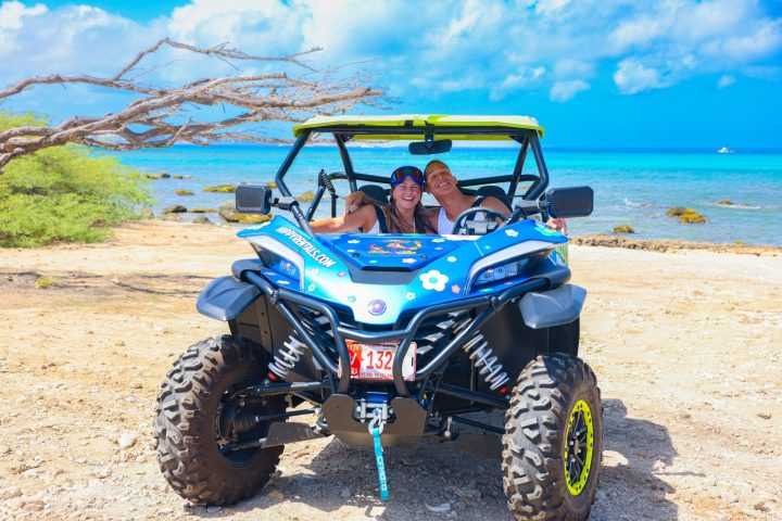 a tractor on a beach